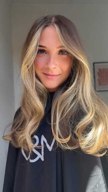 Bright blonde waves at GK Hair & Co
